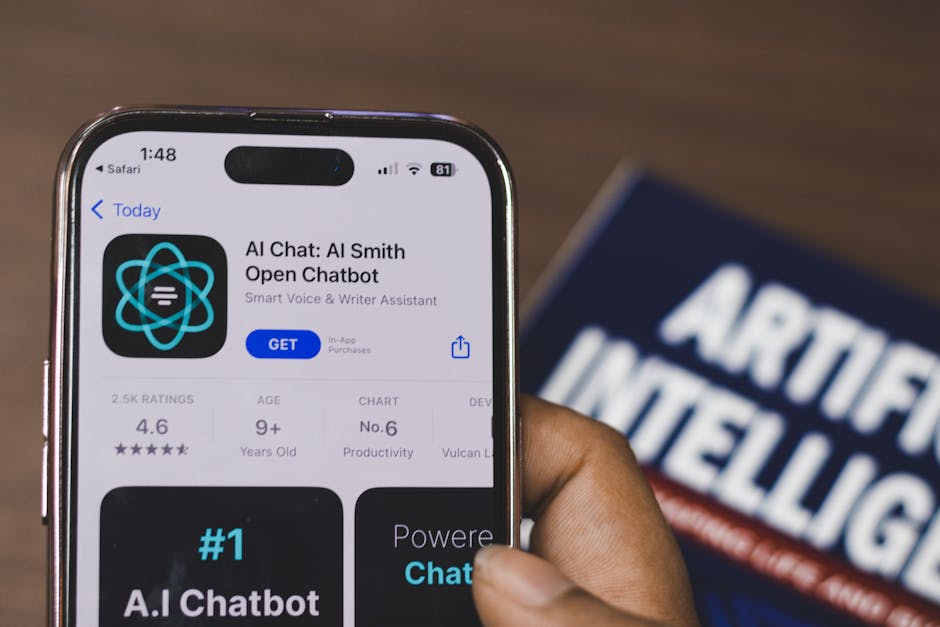 Hand holding iPhone displaying 'AI Chat: AI Smith Open Chatbot' app, a 4.6-star productivity tool. AI book in background.