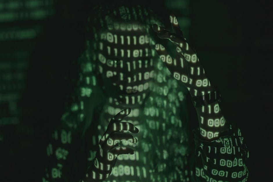 Mysterious figure covered in green binary code, symbolizing AI cybersecurity protecting against intelligent digital threats.