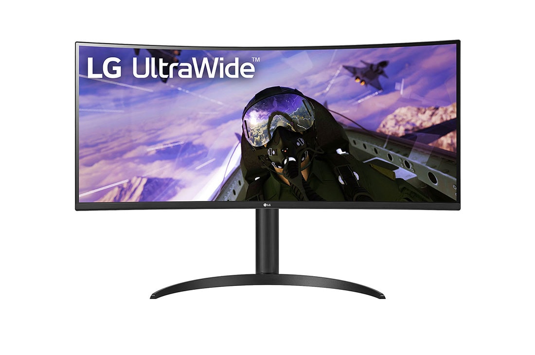 LG 34WP65C UltraWide curved monitor displaying a flight game from a cockpit view with fighter jets.
