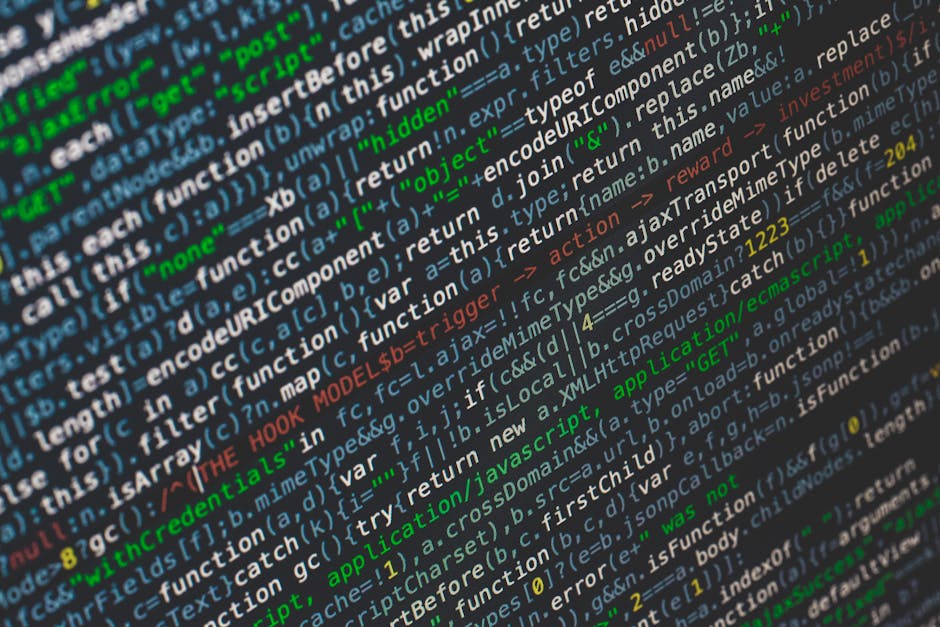 Close-up of multicolored JavaScript code on a dark screen, representing organized development for automated blog systems.