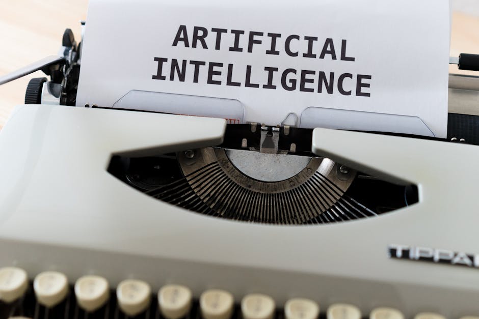 Close-up of a typewriter with 'ARTIFICIAL INTELLIGENCE' typed on paper, signifying AI's role in modern writing.